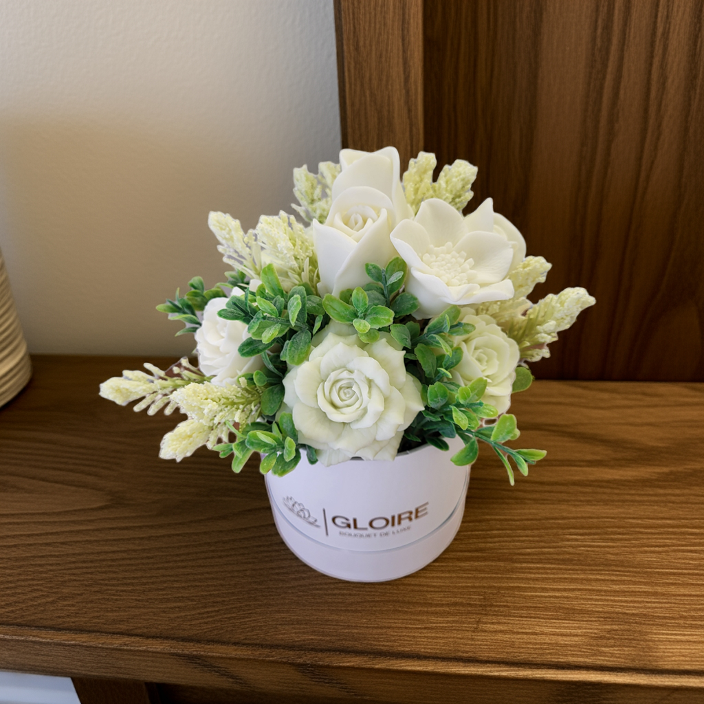 Aéraki – Scented soap bouquet in soft blue and white tones, placed on a living room table with natural light.